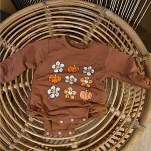Brown Baby Onesie with Pumpkin and Flower Print